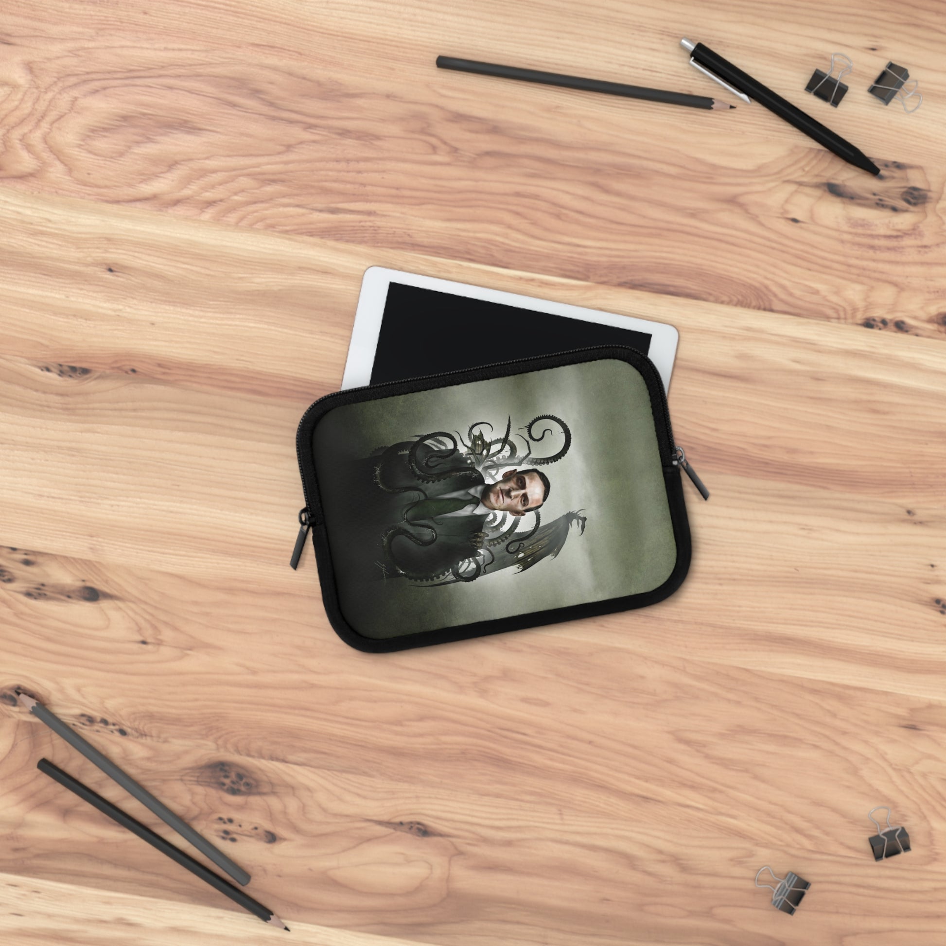 H.P. Lovecraft laptop sleeve flat lay — Mister Sam Shearon Lovecraft collection dark art