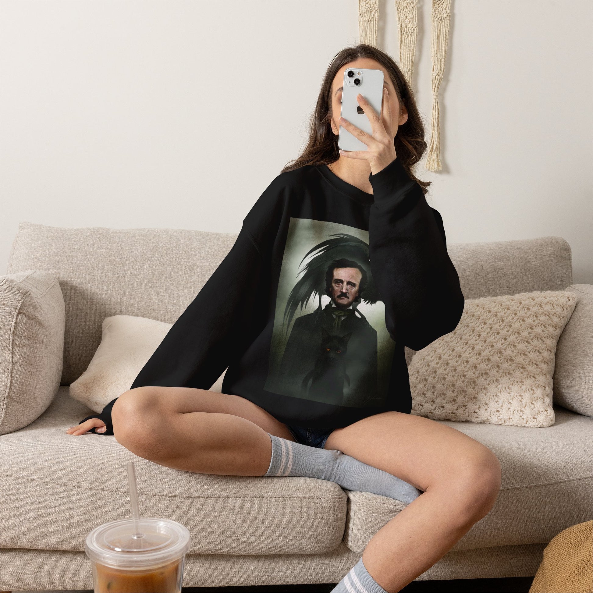 Edgar Allan Poe sweatshirt detail shot — close-up of dark art print on black crewneck
