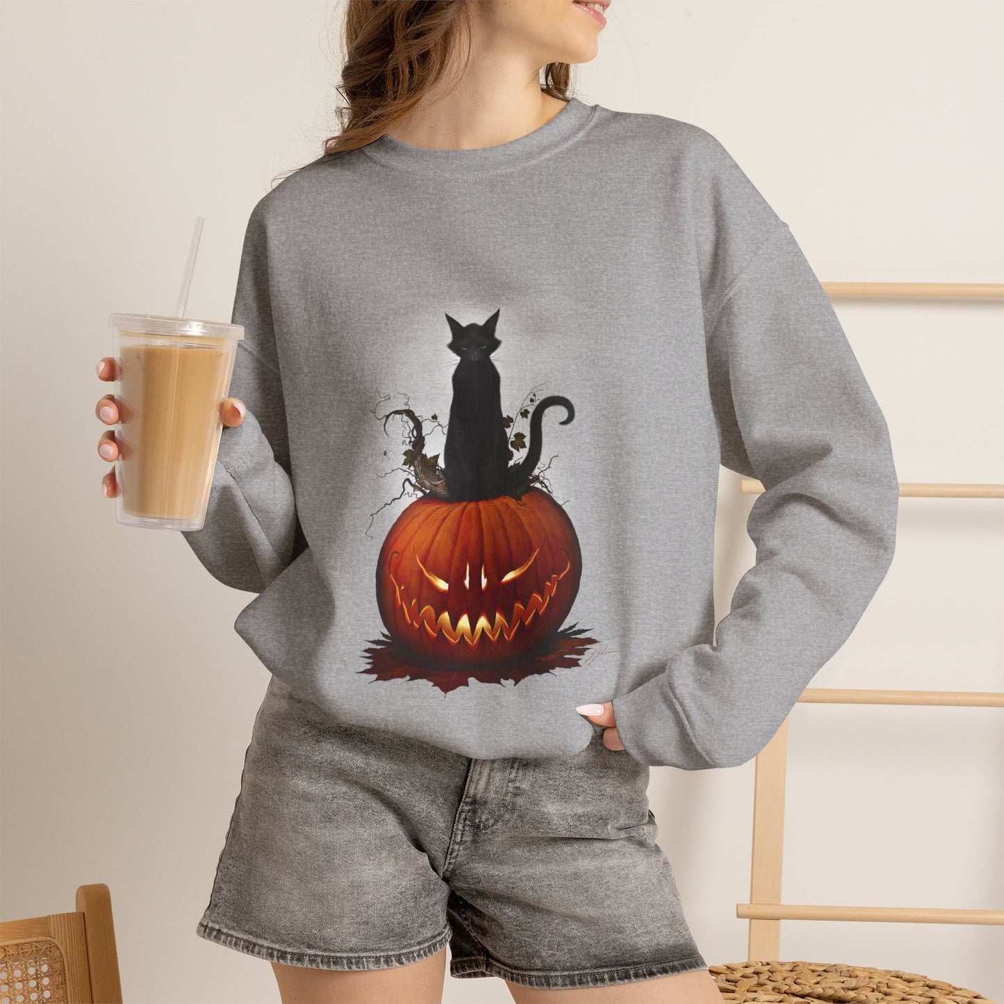 Cat O' Lantern sweatshirt — black cat and pumpkin artwork on unisex crewneck