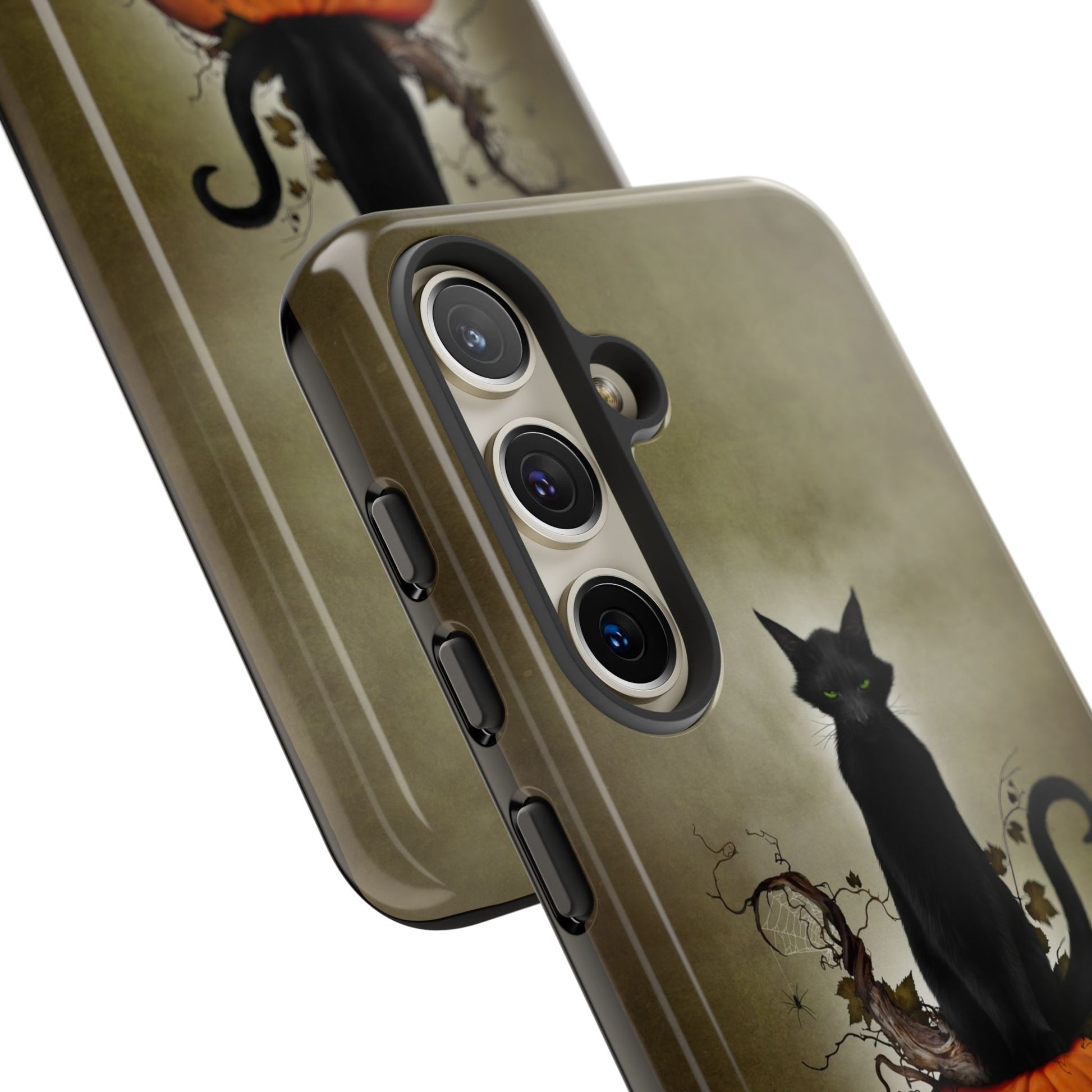 Close-up of Cat O' Lantern phone case on phone showing camera lens cutout
